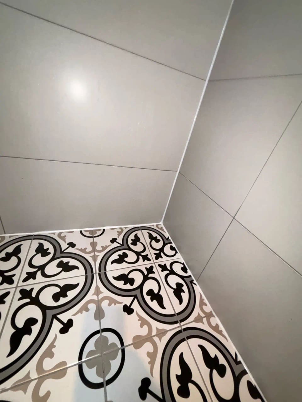 Shower epoxy regrouting · Castle Hill — after shower base closeup